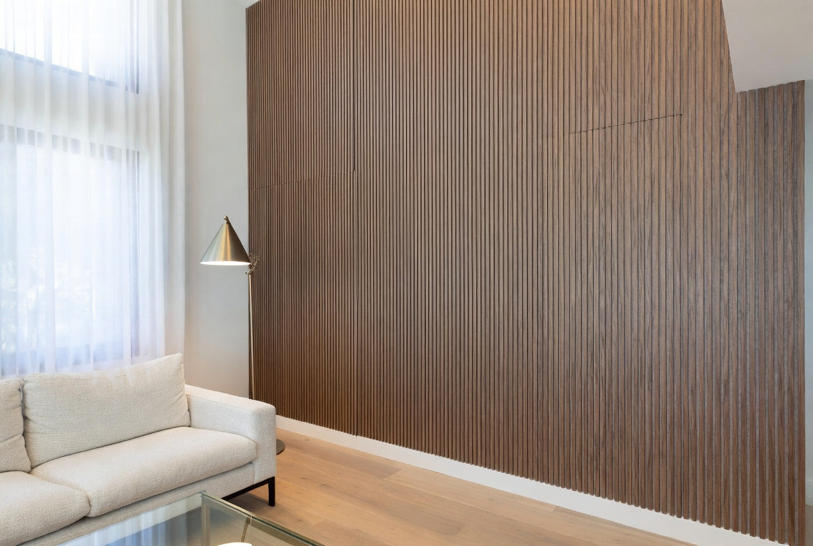 Leo Main 10ft wood slat panels installed floor-to-ceiling in tall modern living room